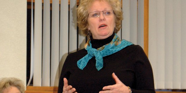 Audrey Danner, standing, explains her background and qualifications to be a Moffat County commissioner Sunday night at the forum held by the Moffat County Republican Party Vacancy Committee. The committee announced Monday night that Danner was its choice to replace the late Saed Tayyara in the District 2 commission seat.
