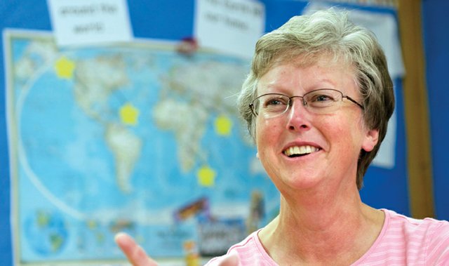 Cheryl Arnett, a first- and second-grade teacher at Sunset Elementary School, talks Friday about the online digital stories program she and a teacher from Beirut, Lebanon developed that connected their students. The pair recently won Microsoft’s 2010 U.S. Innovative Education Forum, qualifying for an international forum in South Africa.
