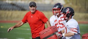 Tim Krumrie, who spent 27 years in the NFL in varied capacities, runs drills during practice Wednesday. Krumrie has joined the Steamboat Springs High School football coaching staff.