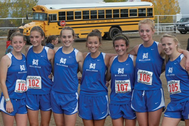 The Moffat County High School girls cross-country team regional competitors are, from left, sophomore Eryn Leonard, freshman Brenna Ciesco, senior Maddy Jourgensen, senior Nike Cleverly, junior Kelly Ciesco, sophomore Bailey Hellander and sophomore Sassy Murray. The girls placed first in the 4A Region 5 meet in Cortez, as did the boys team. Jourgensen and boys runner Chris Zirkle finished first individually in both races.