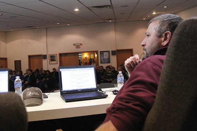 Craig City Council member Byron Willems listens Tuesday at Craig City Hall to other council members discuss the Colorado Division of Wildlife’s options for addressing deer inside city limits. Although the council did not vote on the issue, a small committee of residents and council members will be formed to discuss two of the three DOW options. The council reached general agreement that allowing marksmen to shoot deer in the city at night was not worth further consideration.