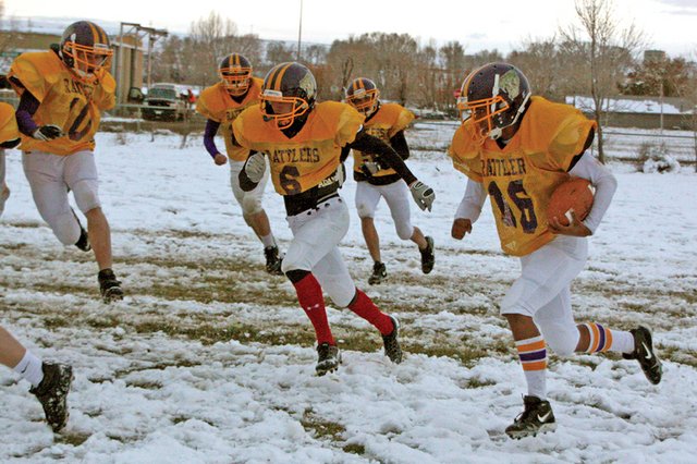 Manuel Quinteros, a Little Snake River Valley sophomore, carries the ball upfield during the Rattlers practice Wednesday in Baggs, Wyo. The undefeated Rattlers play Friday in Laramie, Wyo., against Hanna Elk Mountain Medicine Bow in the 6-Man Wyoming State Championship game. The Rattlers defeated HEM in the regular season, 50-34.