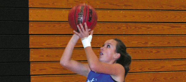 Nike Cleverly, a Moffat County High School senior, goes up for a lay-up during a shooting drill. The MCHS girls varsity basketball team placed second in the weekend’s Shanon Johnson Tournament at Uintah High School in Vernal, Utah. The team’s season record stands at 2-1 after Saturday victories against Wasatch, 37-28, and Union, 51-44.