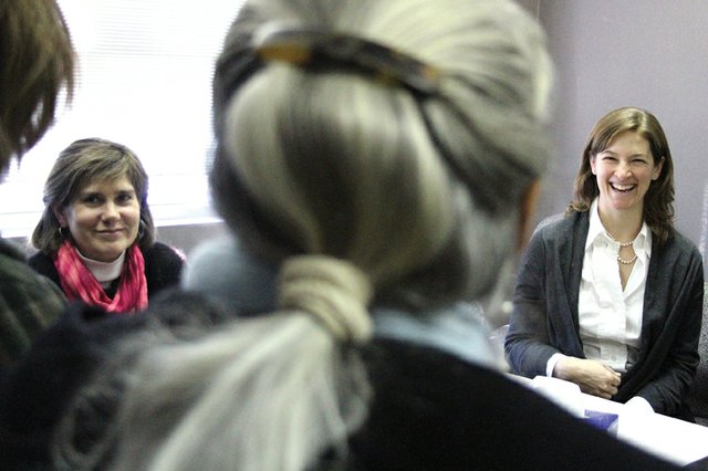 Sue Birch, left, chief executive officer of the Northwest Colorado Visiting Nurse Association, listens Monday to audience comments during a reception in her honor at the VNA’s Craig office. Governor-elect John Hickenlooper recently named Birch executive director of the Department of Health Care Policy and Financing. Her last day with the VNA is Friday, and she will be replaced by Lisa Brown, right, who was named acting CEO.