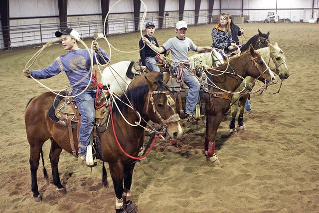 Members of last year’s Moffat County High School rodeo team, from left, Casey Barnes, Trent Vernon, Cutter Barnes, Taylor Vernon and Gabbi Steele practice during the winter. The team lost just two seniors — Taylor Vernon and Gabby Miller — in May and are looking to build a foundation on returning and new athletes.