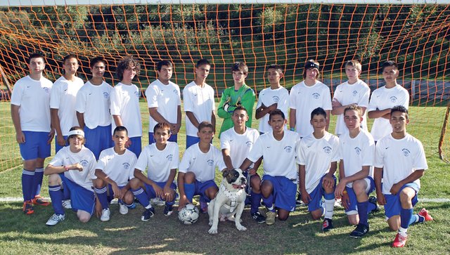 The Moffat County High School boys varsity soccer team took a step forward in 2009, and coach Rusty Cox expects a bigger step in 2010. The team is, back row from left, Adrian Hernandez, Jonathan Pando, Manuel Tarango, Eli Voyich, Inez Quezada, Tracy Mendoza, Dustin Carlson, Johnny Landa, Keegan Welder, Brandon Duncan and Victor Villa. In the front row, from left, is Ben Booth, Jorge Gonzalez, Erik Silva, Alan Flores, Favian Quezada, Alex Perez, Nestor Arellano, Bryant Cox and Lupe Rodriguez. The team’s mascot, Torro the American Bulldog, is pictured front and center. Not Pictured: Cody Fallon and Jorge Torres.