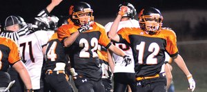 Hayden senior Chad Terry, 12, pumps his fist after the Tigers’ defense came up with a key goal-line stand late in Friday night’s 13-6 win against Paonia.