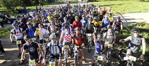 Participants in the second annual Ride 4 Yellow mountain bike ride gather before the start of the 26-mile challenge Aug. 7. The proceeds from the 2011 Ride 4 Yellow and Ski 4 Yellow events will be split between local cancer causes and the Livestrong Foundation.