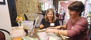Sisters Tammy Innes, right, and Cherie Pitman cut apples during a Sisters in Steamboat cooking class at City Cafe at the 2011 event.
