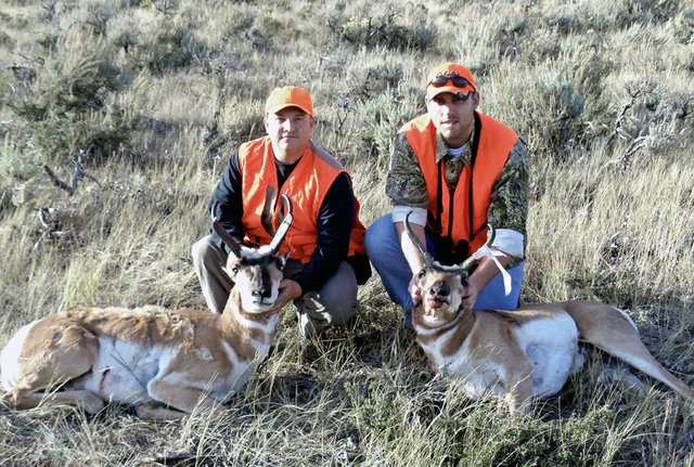 Jared Midgley, left, a U.S. Army veteran of Operation Iraqi Freedom, and Jesse Leech, a U.S. Marine Corps veteran of Operation Enduring Freedom, pose with their antelope harvested Oct. 2 at the Bord Gulch Ranch northwest of Craig. Midgley and Leech participated in a recreation therapy hunting program sponsored by the Veterans Affairs Medical Clinic in Grand Junction.