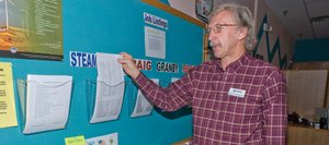 Brian Bradbury, an employment specialist at the Colorado Workforce Center's branch in Steamboat Springs, sorts through bins filled with job listings. Routt County's unemployment rate jumped about 0.5 percent from September to October but still is significantly lower than the unemployment rate from a year ago.