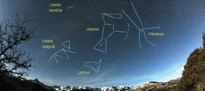 The great bullfight, starring Orion the Hunter, Taurus the Bull, Canis Major the Big Dog, Canis Minor the Little Dog and Lepus the Rabbit, takes place every clear night in our winter skies, as seen in this wide-angle view looking out over the moonlit Mount Sneffels Wilderness near Ridgeway.