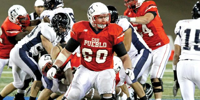 JT Haddan, a 2008 Moffat County High School graduate, looks for a block against Colorado School of Mines on Oct. 6 in Pueblo. Haddan, who plays guard for the Colorado State University-Pueblo football team, received first-team all-region and NCAA Division II third-team All-American honors from Don Hansen’s Football Gazette for his play this season.