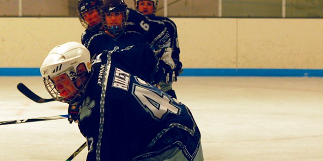 Moffat County High School freshman Thayne Riley prepares for a face-off near his own goal during the Moffat County Bulldogs club hockey team’s Saturday game against Grand Valley. The team went 2-1 over the weekend, losing a game against Glenwood Springs and defeating Grand Valley twice. The Bulldogs will move on to the Frozen Four tournament to end the season.