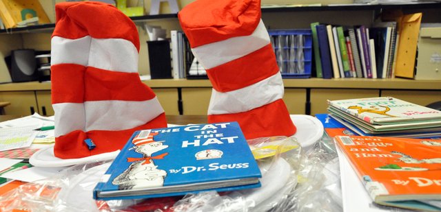 Dr. Seuss books and hats for Read Across America Day wait in Krista Schenck’s classroom Thursday afternoon at Moffat County High School. Schenck, Moffat County Education Association co-president, helped organize reading activities for the annual event, which took place Friday in Craig elementary schools.