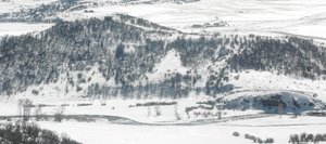 The Yampa River flows through a snow-covered hay field on Tailwaters Ranch, which sold in January for $17.65 million. The new owners plan to keep the ranch for their personal use as a trophy trout fishery.