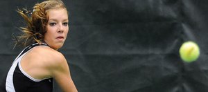 Rachel Grubbs sets up for a backhand return Saturday as the Steamboat Springs High School girls tennis team beat Air Academy, taking six of seven matches. Grubbs, playing No. 2 singles, won in two sets.