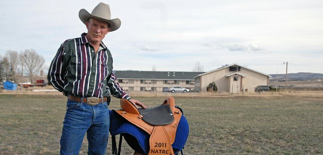 Craig resident Ken Wolgram poses with his brand new saddle, an award he received for winning the North American Trail Ride Conference President’s Cup. Wolgram and his horse, Awesomes Fire N Ice, also took home the Jim Menefee, Bev Tibbetts and Polly Bridges awards completing the first ever grand slam in the NATRC’s 51-year history.