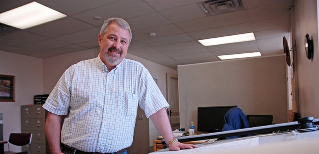 Roy Tipton, director of the newly created Moffat County developmental services department, reviews plans in his office at the Moffat County Courthouse, 221 W. Victory Way. First on Tipton’s agenda is engineering, survey and soil sample work at Shadow Mountain in preparation for capital improvement projects with the City of Craig.