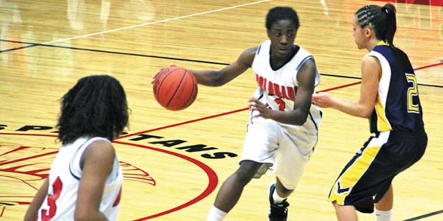 Jaynelle Johnson, a sophomore point guard from Denver, drives past a defender earlier this season while playing for the Colorado Northwestern Community College women’s basketball team. Johnson was named a second-team all-region player this season while leading the Spartans to an overall record of 11-20.