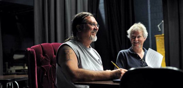 Bill Ronis pauses during a read-through of “Taming the Wilderness, or the Founding of a Town” on Monday night inside Craig Middle School’s auditorium. David Morris, a CMS English and theater teacher, took a tongue-in-cheek approach to the founding of Craig when he wrote the play, which Black Mountain Theatre is producing.