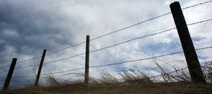 Storm clouds roll over a fence line near Steamboat Springs on Wednesday. With the unusually dry weather and busy wildfire season, fire officials have recommended fire restrictions to be put in place for Routt County. Along with the rain Wednesday night, the National Weather Service is forecasting a chance of rain or snow until Sunday.