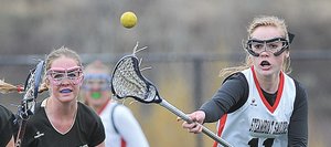Steamboat Springs junior Emily Spiess passes the ball to a teammate during Friday afternoon's game against the Battle Mountain Huskies at Gardner Field. Battle Mountain won, 12-4.