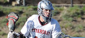 Steamboat’s Ben Wharton shrugs off a Battle Mountain player April 6 en route to an 8-5 victory in Steamboat Springs. The Sailors boys lacrosse team has won 39 consecutive Mountain Conference games and is in the midst of a 13-1 season.