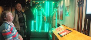 Denver resident Connie North takes in the “Jumping for Joy” exhibit Saturday in the History Colorado Center on its opening day. The exhibit features memorabilia from Steamboat skiing history such as a gondola car and the Lighted Man costume.