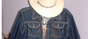 The studded denim jacket in this cowgirl ensemble, a consigned item at Deja Vu Boutique, is priced at $27.