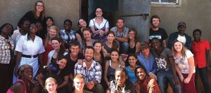 Heritage Christian School students pose in front of the Wakiso Christian International Academy in Rwanda during a mission trip in April.
