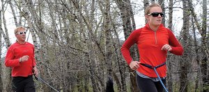Erin Taylor and dog Brody and Chris Taylor and Dee jog along the Yampa River Core Trail on Wednesday afternoon in Steamboat Springs. Runners of all types will take to the roads and trails this summer for the Steamboat Springs Running Series, which kicks off its season in about nine days with the Spirit Challenge.