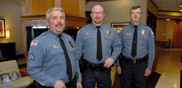 Craig Police Department members, from left, Sergeant Corey Wagner, Officer Mike Edwards and Officer Lance Eldridge were named Officers of the Year by the Colorado Law Enforcement Officers Association Friday for pulling a Craig resident from his burning house in February. The man, Patrick Hunter, later died from injuries sustained in the fire, but Hunter’s children both said the officers were deserving recipients.