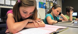 Morgan Graham, a third-grader at Soda Creek Elementary School, reads Wednesday afternoon during class. Steamboat’s third-graders posted record scores on this year’s state reading test.