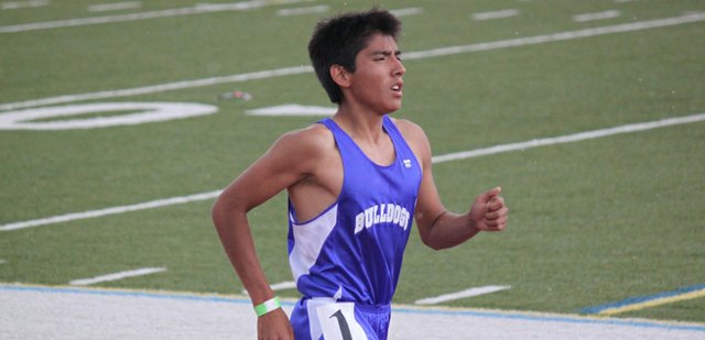 Moffat County High School senior Dale Nakai crosses the finish line first in the 3,200-meter run at the Western Slope League Meet in Grand Junction. Nakai and several other MCHS track and field team members qualified for state at the meet, including the boys 4-by-800-meter relay team, which set a new school record.