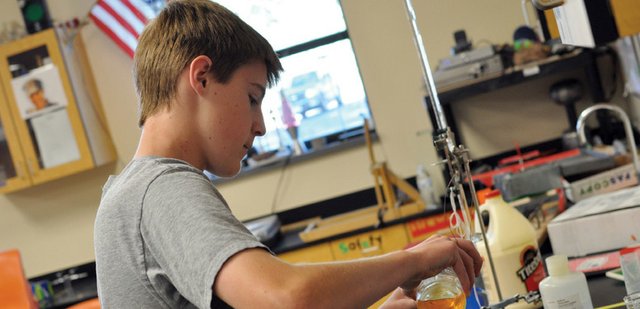 Connor Knez, 14, a student in Craig Middle School’s River Watch program, tests oxygen levels in a water sample from Fortification Creek on Tuesday morning in Norm Yoast’s classroom at the school. Yoast’s students have consistently provided reliable data to state agencies charged with maintaining water standards, said Barb Horn, a Colorado Parks and Wildlife water resource specialist.