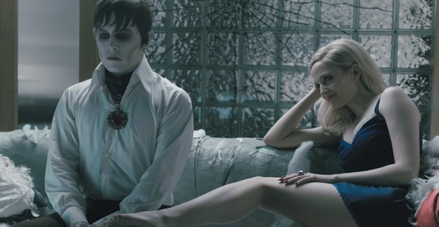 Centuries-old vampire Barnabas Collins (Johnny Depp) tries in vain to resist the seduction of witch Angelique (Eva Green) in “Dark Shadows.” The movie, a big screen remake of the 1960s gothic soap opera, is about an industrialist from colonial America who is cursed with immortality and awakens 200 years later to reclaim his family’s honor.