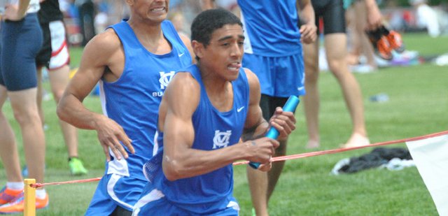 Moffat County High School senior Alfredo Lebron takes the baton from senior Miguel Molina in the 4-by-800-meter relay Thursday at the 4A state track and field championships. Besides being part of the winning relay team, Lebron won the 800-meter run Friday morning with a time of one minute, 55.01 seconds. Lebron, Molina, senior Johnny Landa and junior Erik Silva-Tarango also competed in the 4-by-400-meter relay Friday, placing 13th.
