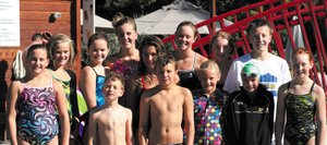 Members of the Steamboat Swim Team celebrate after competing in Grand Junction during the weekend.