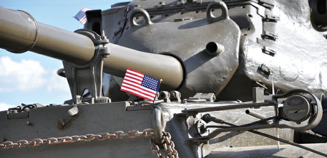 An American flag flutters on an M47 tank shortly after its arrival June 27 at Wyman Living History Museum. Lou Wyman, the museum’s founder, purchased the newly restored tank five years ago and plans to display it during today’s Fourth of July parade, scheduled to start at noon at Veterans of Foreign Wars Post 4265, 419 E. Victory Way.