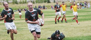 Tucker Brock scores a try Saturday during the 38th annual Cow Pie Classic rugby tournament. Steamboat won the tournament for the fifth time in six years, beating Wyoming, 13-8.