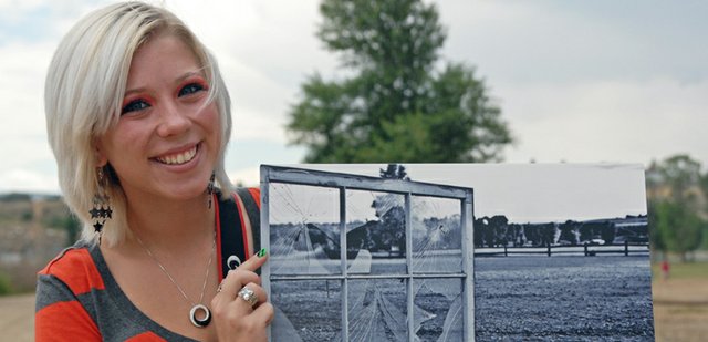 Carli Griffith, an incoming Moffat County High School senior, poses with a print of “Broken” near the site of where she took the photograph at Loudy-Simpson Park in Craig. Griffith submitted the photograph to a Photographer’s Forum contest. It was chosen as one of 600 finalists and is currently featured in the book Best of College and High School Photography 2012.
