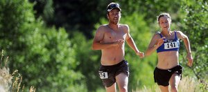 Callie Bradley, right, and Matt Eggen sprint down one of the final stretches of Saturday's Spring Creek Memorial Run in Steamboat Springs. Bradley won the women's side of the 9-mile race, finishing in 1 hour, 15 minutes and 38 seconds.