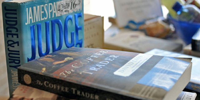 Books lie stacked on a table during a book sale in late June outside the Craig branch of the Moffat County Libraries. The library, 570 Green St., is hosting a book sale throughout the year with the Friends of the Moffat County Library to fund ongoing improvements. The library also recently began selling snacks and drinks for summer readers.