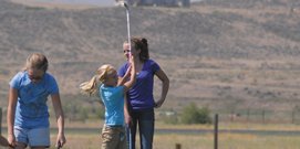 Halle Hamilton, 8, hits from the driving range at Yampa Valley Golf Course Wednesday. Hamilton was one of 12 girls to take part in a Ladies Professional Golf Association Girls Golf Day. The program, led by Moffat County High School girls golf coach Ann Marie Roberts, helped girls ages 4-16 with their swing and understanding of golf.