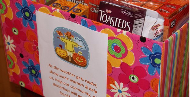 A donation box sits in the lobby of Yampa Valley Bank in Craig. Monday marked the start of local banks collecting donations of food and cash for the Inter-Faith Food Bank in Craig. As the holiday season approaches, the food bank is low on food and funds. Local banks will be accepting donations through October 5.