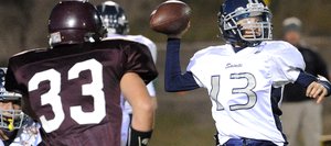 Vail Christian's Austin Ellsworth gets a pass off through the Soroco defense Friday night in Oak Creek. The Saints offense wasn't great, but its defense more than made up for that. Vail Christian won the game, 26-6.