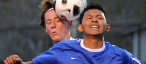 Steamboat's Hanson Buchner and Moffat County's Alex Perez battle for a ball Thursday. Steamboat won the game, 4-1.