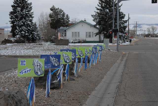 Signs at the corner of Finley Lane and Victory Way wish the runners and coaches of the Moffat County cross country team luck at the Colorado High School State Championship Meet. The girls team and boys runner Jarrett Johnson are competing at noon and 10 a.m. Saturday, respectively, at the Norris Penrose Events Center in Colorado Springs.