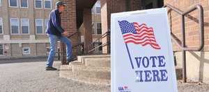 Routt County resident Chan Spear heads into the Routt County Courthouse annex Thursday to cast his vote in the 2012 election.